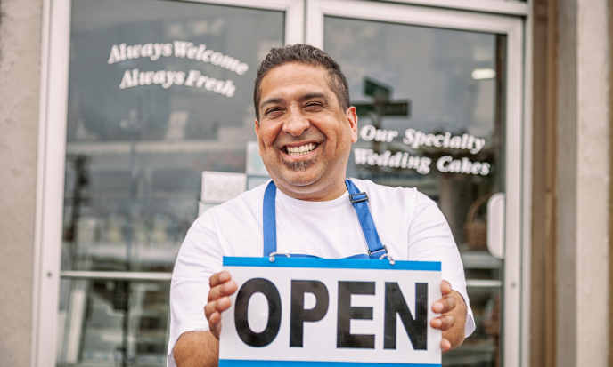 Smiling man holding an 